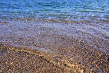 Sea wave and beach.