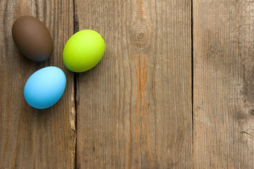 Easter eggs on wooden background