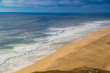 Top view of Praia do Norte beach in Nazare, Portugal