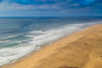 Top view of Praia do Norte beach in Nazare, Portugal