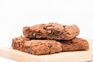 Chocolate biscuits on the wooden retro board.