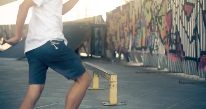 Skateboarder on skate doing grind tricks and failed HD video on skateboard park. Urban extreme sport lifestyle