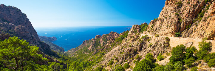 Stunning scenery of D81 road through the Calanches de Piana on the west coast of Corsica, France,...