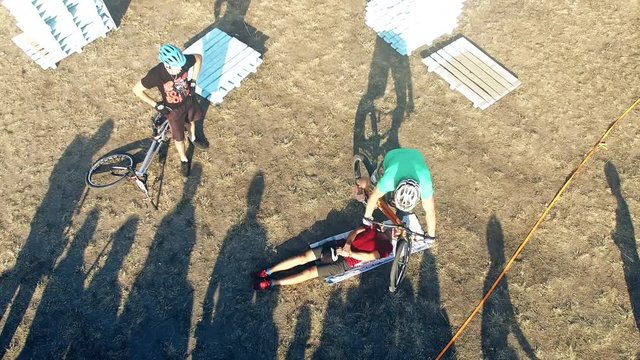 Cyclists jump over people in bicycle aerial video. MTB tricks in Mountain bike trial. Extreme sport lifestyle