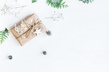 Christmas composition. Christmas gift, pine cones, thuja branche