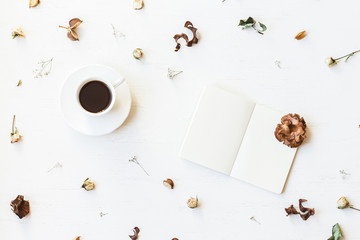 Autumn composition. Workspace with notebook, cup of coffee, autu