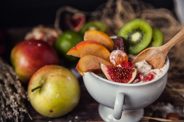 Oatmeal with berries, fruits and nuts