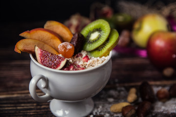 Oatmeal with berries, fruits and nuts