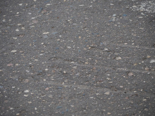 texture of asphalt, traces of caterpillars