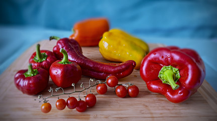 fresh ripe red yellow orange peppers, home grown autumn harvest