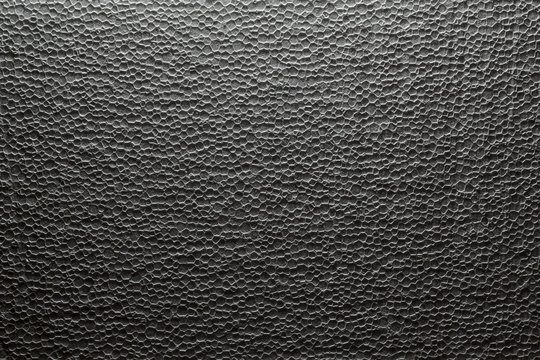 Texture of polystyrene cutting. Styrofoam slice pattern