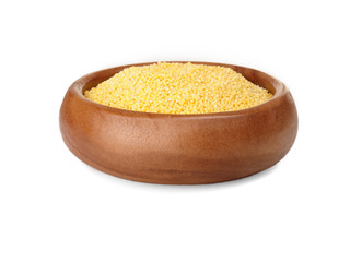 millet groats in a wooden bowl on a white background. ingredient for a healthy lifestyle. 