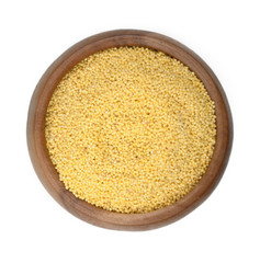 millet groats in a wooden bowl on a white background. ingredient for a healthy lifestyle. 