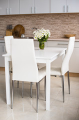 interior of new bright white home kitchen