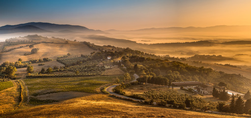 Sunrise with Fog over Tuscan village - obrazy, fototapety, plakaty