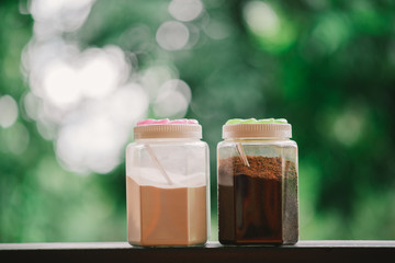 Glass bottles , coffee and sugar