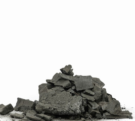 pile of charcoal on white background