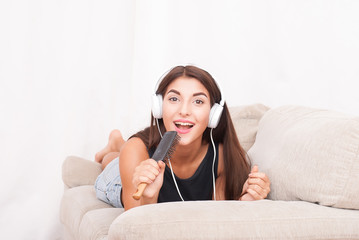 Woman listening music in headphones