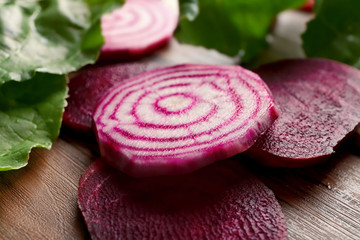 Fresh sliced beetroot with tops, closeup