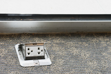 electric plug adapter on floor ready to use as electric appliance at home or office
