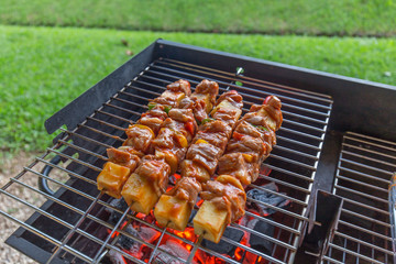 barbecue grilled time on green grass