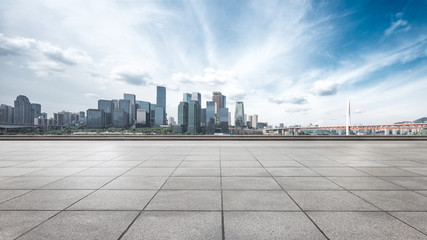 cityscape and skyline of chongqing from empty brick floor