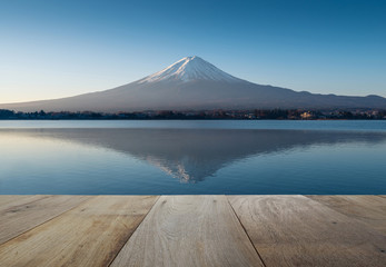wooden terrace and mount fuji in the early morning with reflecti - obrazy, fototapety, plakaty