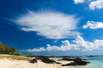 Landscape with  clouds on the shore of the ocean. Mauritius Island