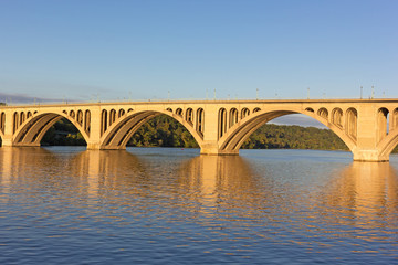 Obraz na płótnie Canvas A sunrise over Key Bridge in Washington DC. A view on Key Bridge over Potomac River from the District of Columbia, USA.