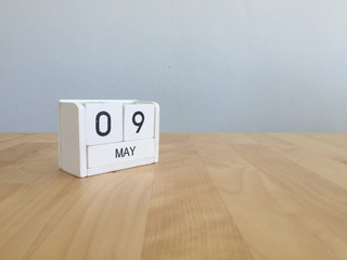 May 9th.May 9 white wooden calendar on vintage wood abstract bac