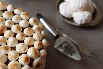Tasty cake with marshmallow and biscuit