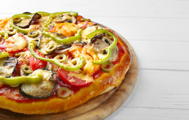 Tasty homemade pizza on table