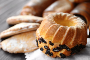 Fresh tasty muffin, closeup