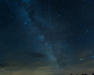 Fototapeta na wymiar Milky Way with a Meteor, Saturn, Mars & Pluto