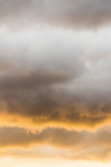 Fototapeta premium Thick clouds at sunset