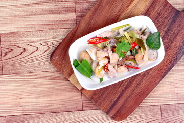 Chicken and galangal in coconut milk soup and herb .