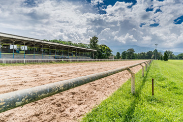 Fototapeta na wymiar Old wooden grandstand of racecourse