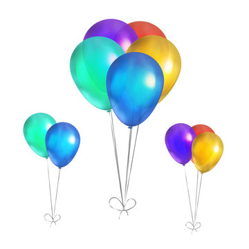 Glossy colorful balloons isolated on white