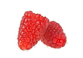 Ripe raspberries isolated on a white background, close up