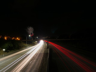 Fototapeta na wymiar Freeway exposure ft. fireworks