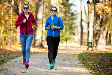 Two women running 