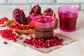 juice and ripe red pomegranate
