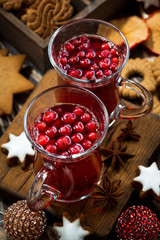 Christmas drink hot cranberry tea and cookies, vertical