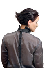 Fashion photo of attractive young brunette woman with styled and flying short hair