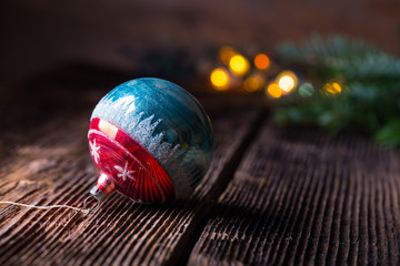 Old vintage Christmas balls on wooden table