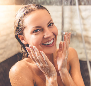 Fototapeta Beautiful woman taking shower