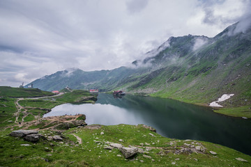 Balea Lake next to Transfagarasan Road in southern section of Carpathian Mountains in Romania