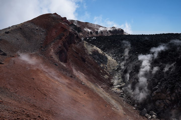 Smoking lava in the crater of the Avachinksy Volcano, Kamchatka, Russia. The lava raised to the top of the crater during the eruption in 2001. © nielsvos