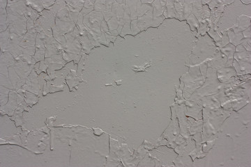 metal, rusty, surface painted in gray paint