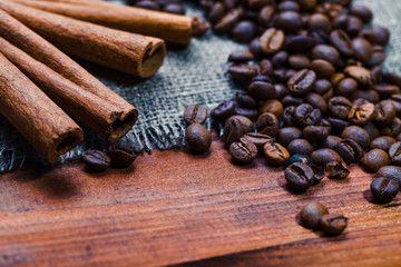 Coffee beans on wood background